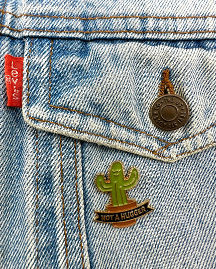 Not a Hugger Pin Badge | Tags: Accessories
