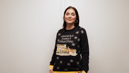 Suéter feo de Navidad de la familia Griswold con luces LED