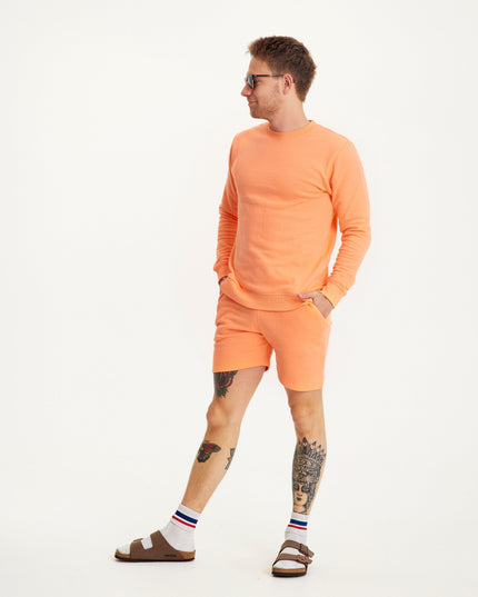 Conjunto de ropa de casa de durazno de verano para días cálidos
