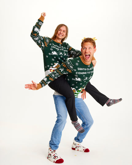 Suéter Iluminado de Santa Claus Está Viniendo a la Ciudad