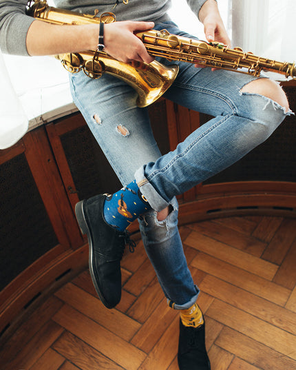 Samling af sjove sokker med musiknoter fra Many Mornings