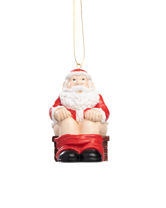 Santa der tisser ned i skorstenen figur